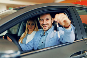 couple in new car